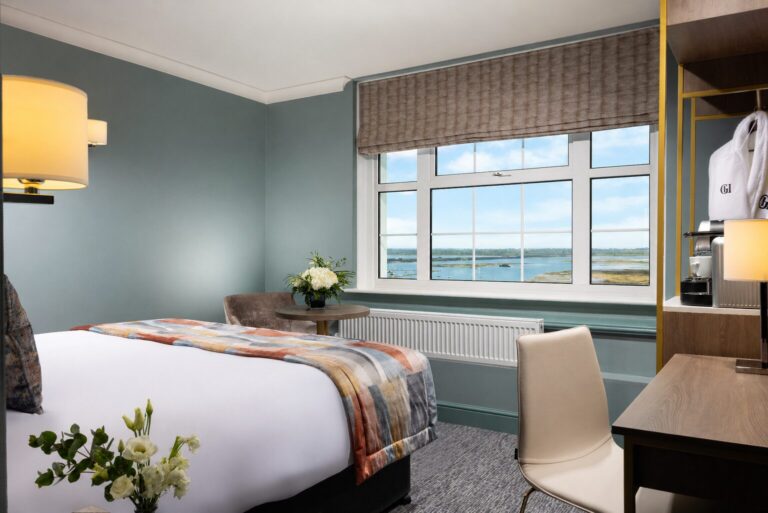 Double room with sea view and a striped blackout Roman blind, The Grand Hotel Malahide
