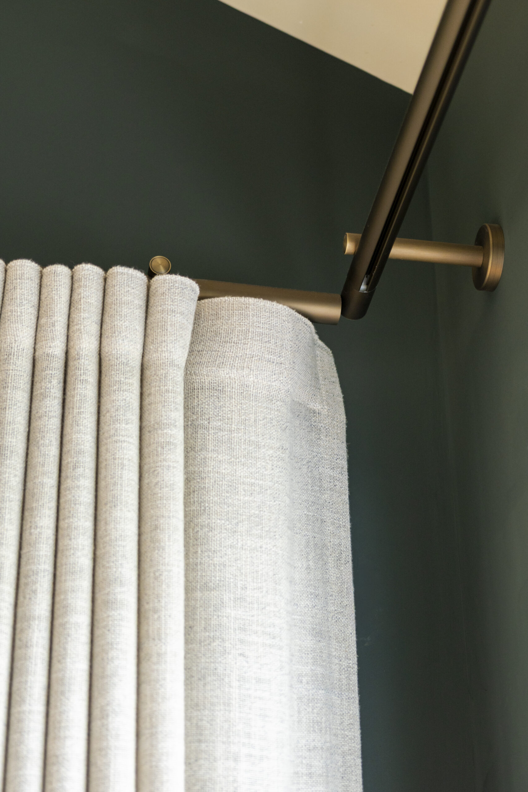 Close-up of a CWF curtain track with wave curtain fabric