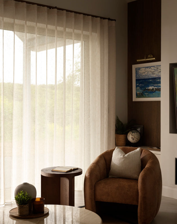 Core 16 Almond wave voile hung on an antique brass 9001 curtain track