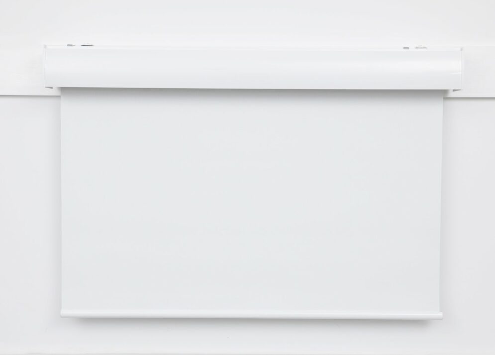 New York roller blind with rounded white headrail