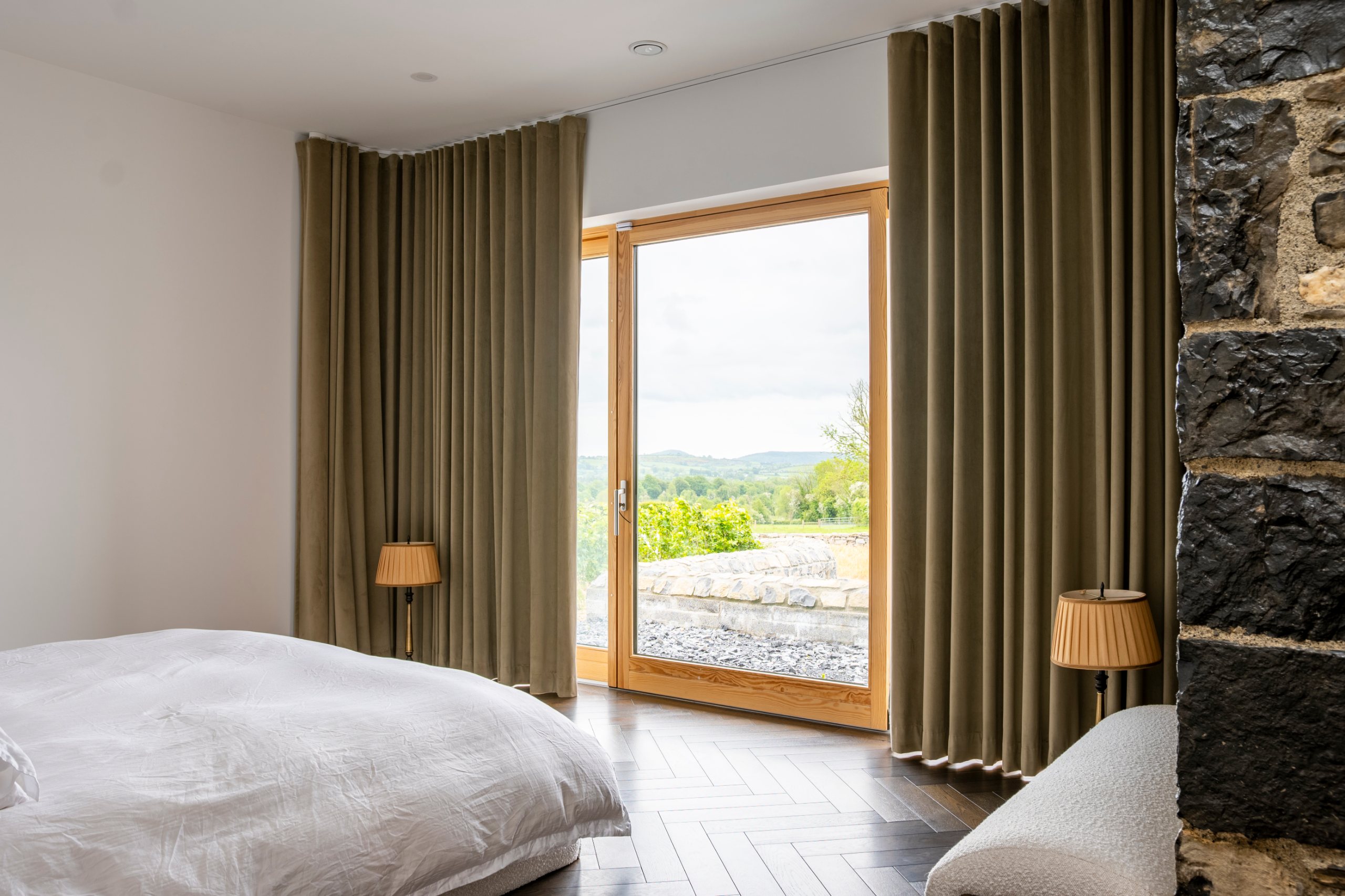 Velvet wave curtains from Motion Collection on a CWF track in the Midlands Gem bedroom extension