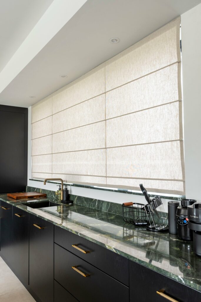 Made-to-measure Roman blind on a Danish Heavy Duty electric kit in a Multyfarnham kitchen