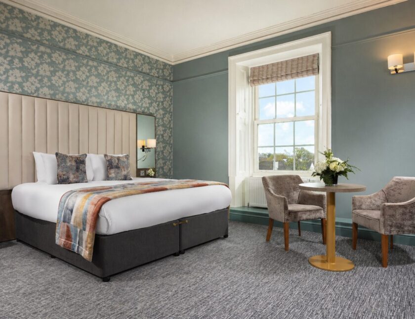 Bedroom at The Grand Hotel Malahide with a chain-operated Roman blind